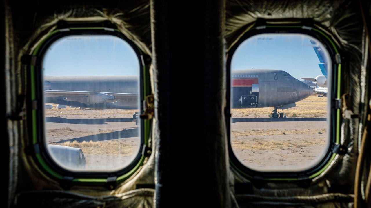 The view from an interior of a retired TWA 747 looking out on to Pinal Airbase. Pinal Airpark is sometimes called a graveyard or boneyard for planes.